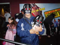 A guy, a duck, and Vader masks